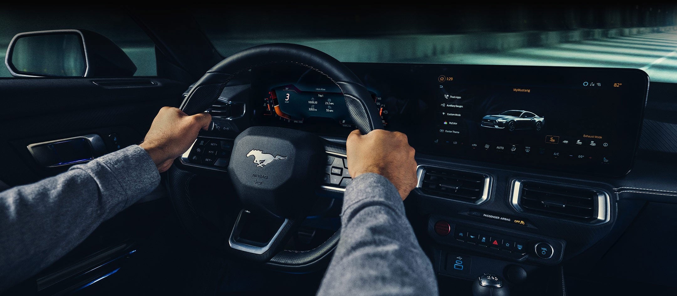 A 2024 Ford Mustang® model interior with a person driving | Lynch Ford of Mukwonago in Mukwonago WI