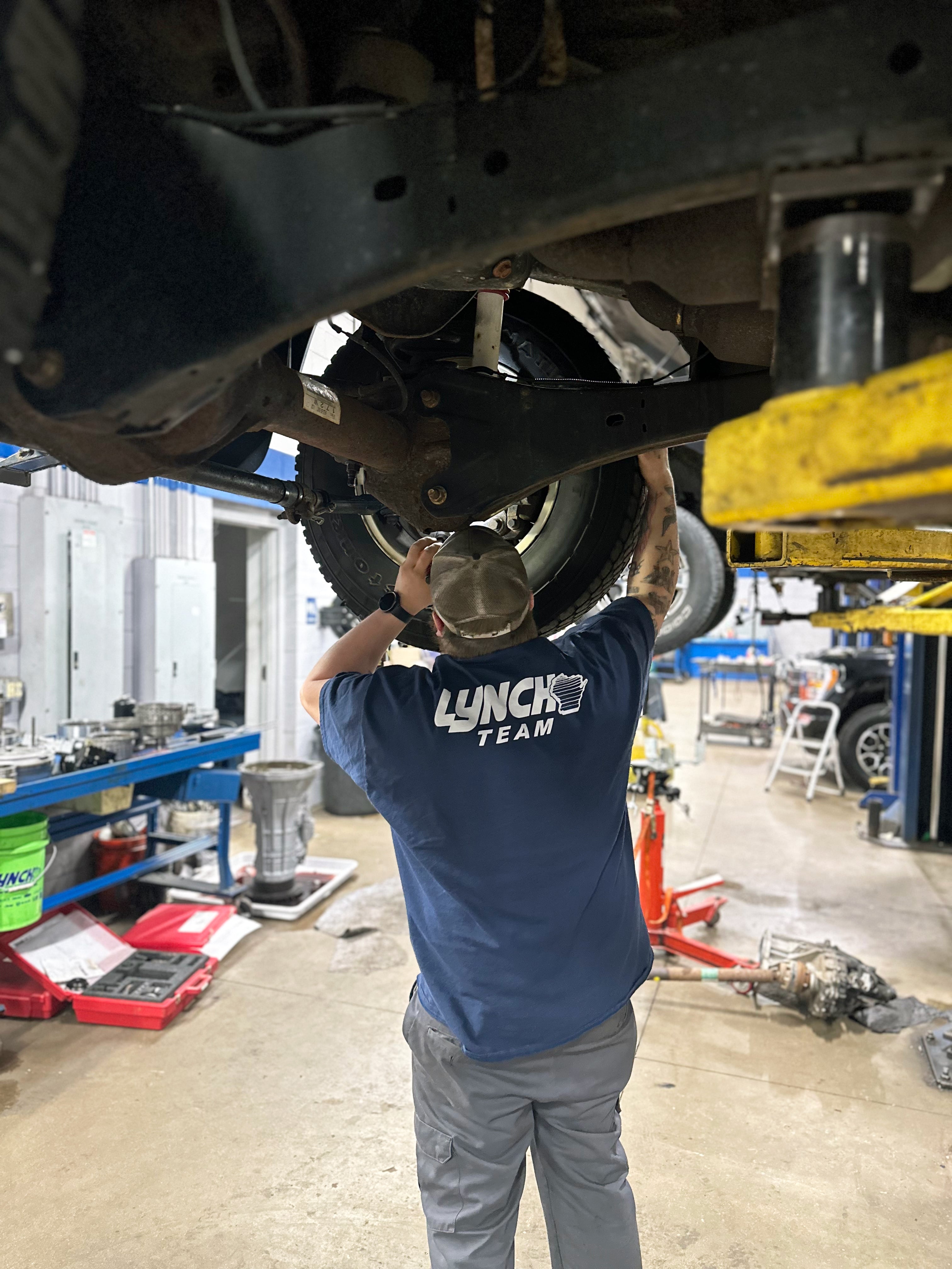 Technician Working on Tires